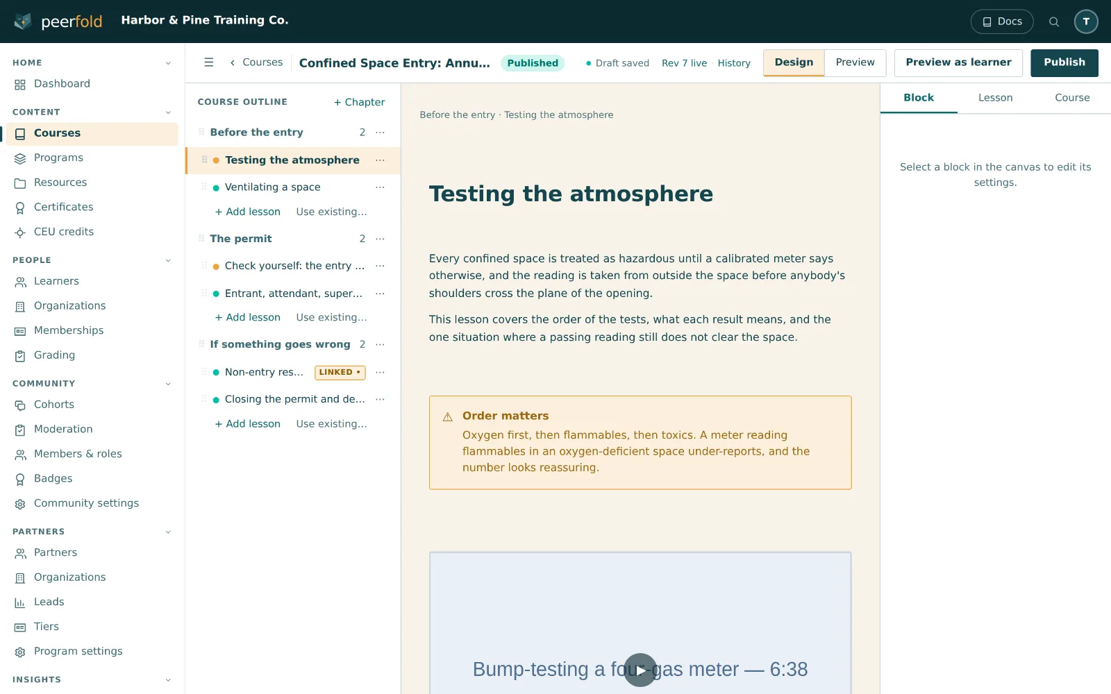 The three-pane course editor, with the chapter outline on the left, a lesson open on the canvas, and the block inspector on the right.